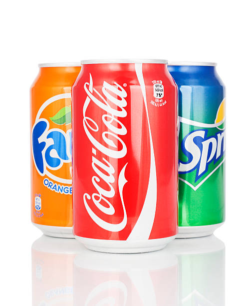 Can of Coca Cola, Fanta and Sprite isolated on white background. Coca-Cola company made carbonated soft drink.